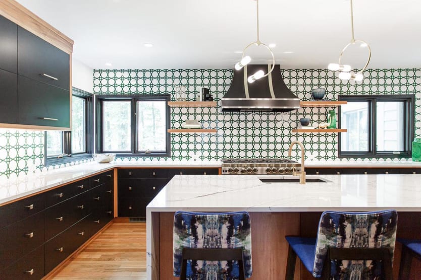 A kitchen with Moroccan-inspired tile backsplash